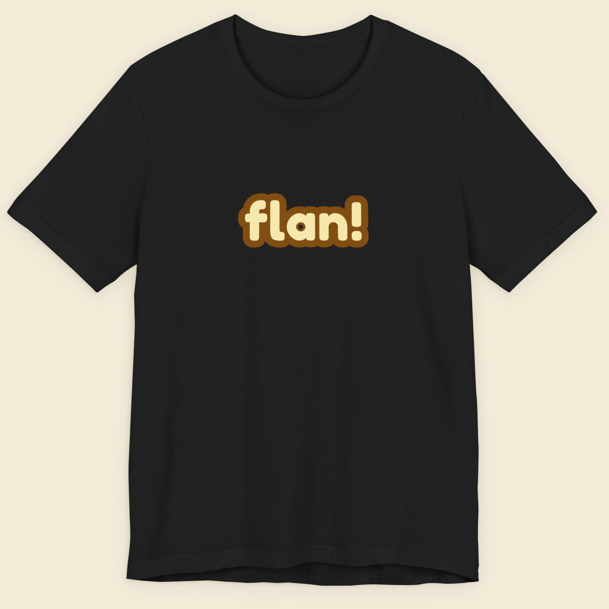 Black t-shirt with 'flan!' text on a beige background