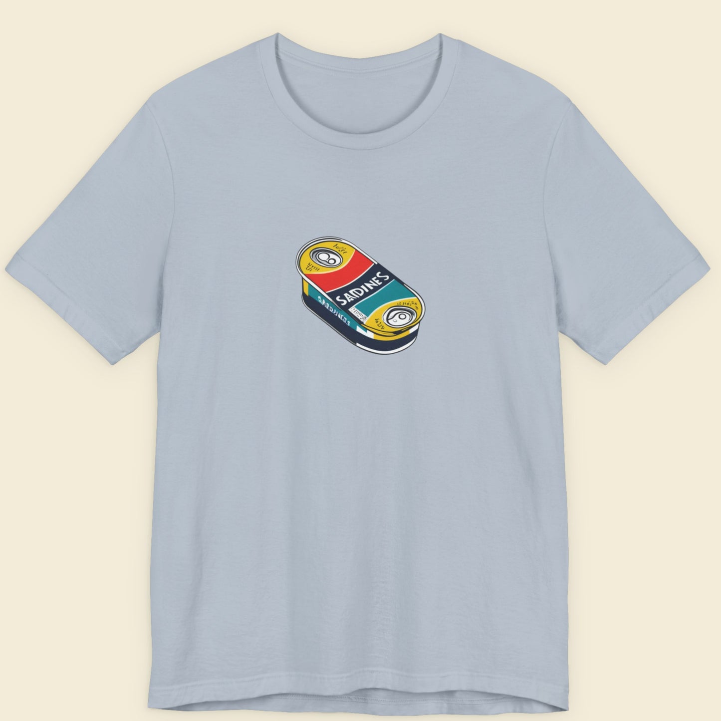 Light blue shirt with an illustration of a flat can of sardines