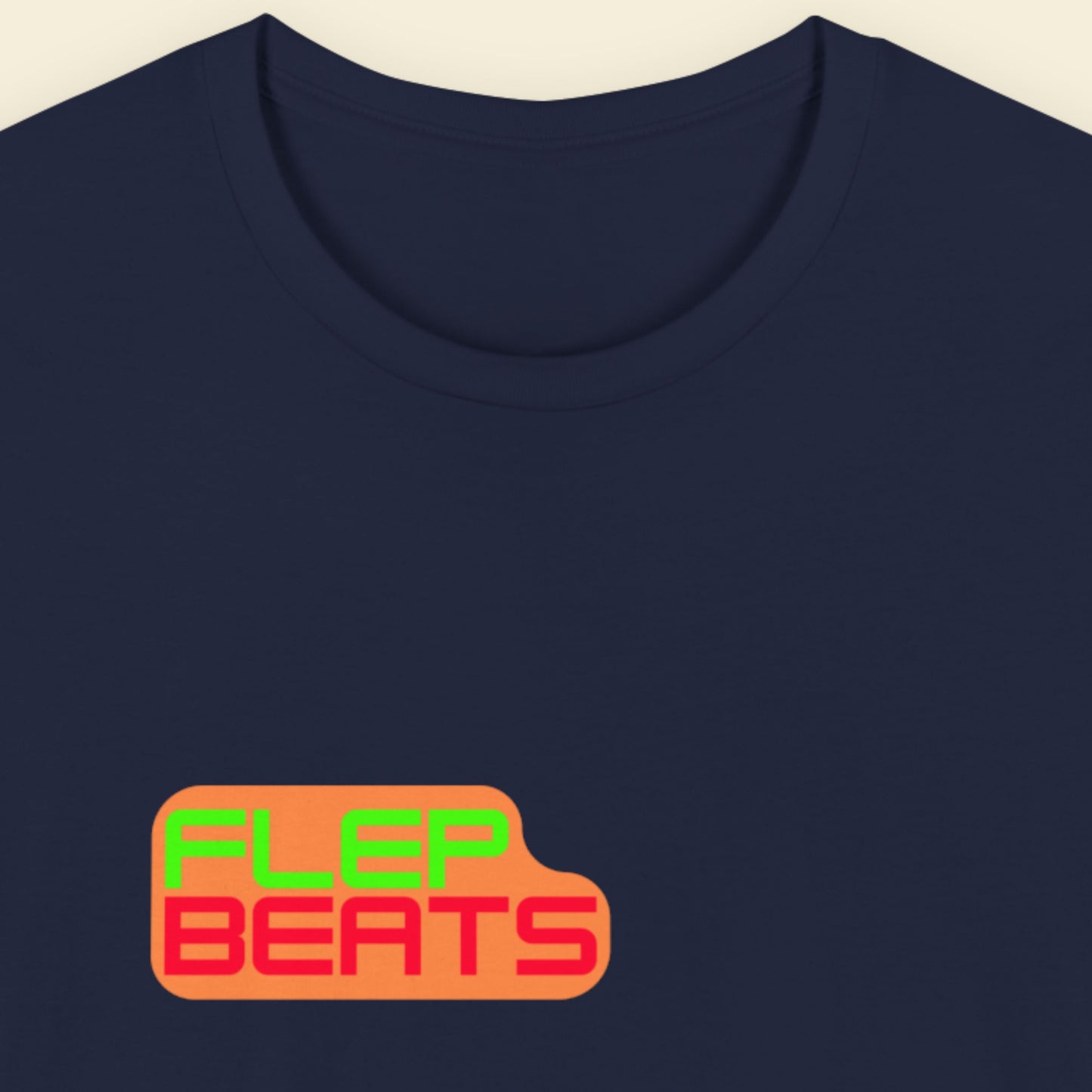 Navy blue t-shirt with 'FLEP BEATS' logo in green and red on a beige background.