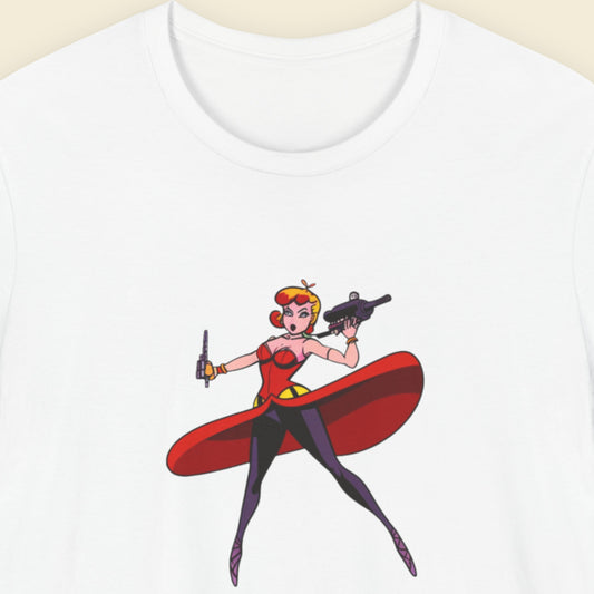 White t-shirt with a fun, colorful cartoon comic book illustration on a beige background.