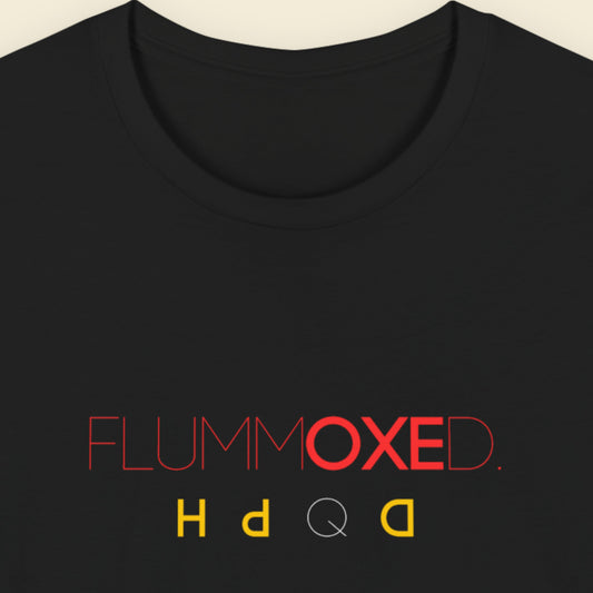 Black t-shirt with humorous colorful text on a beige background.