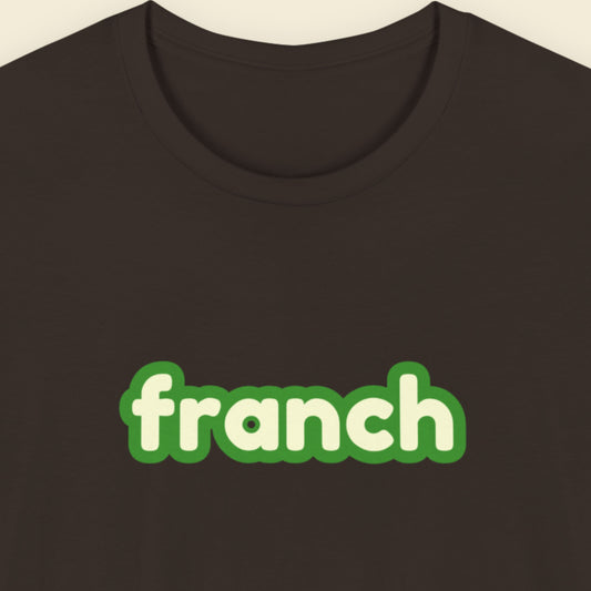 Brown t-shirt with humorous colorful text on a beige background.