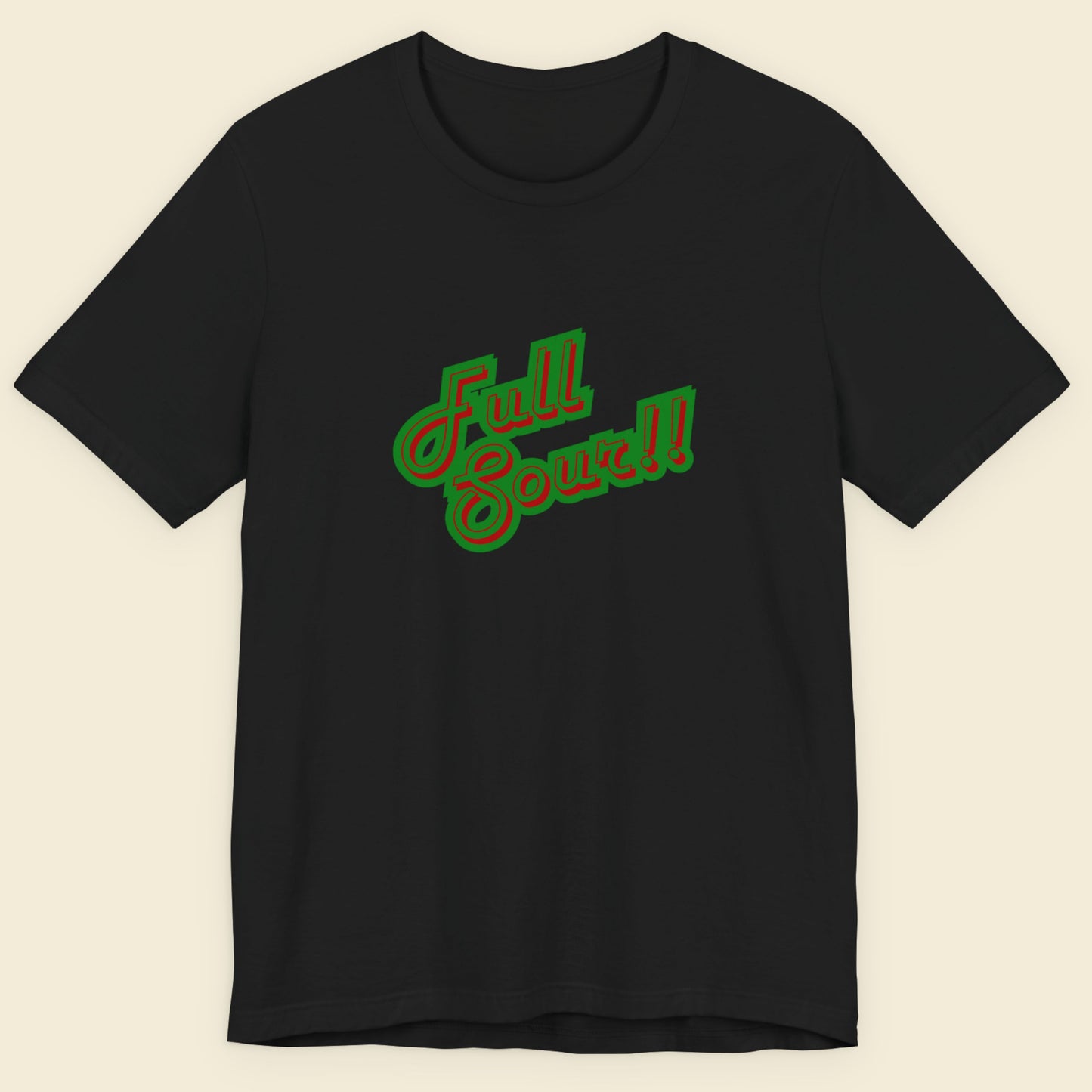 Black t-shirt with colorful humorous text on a beige background.