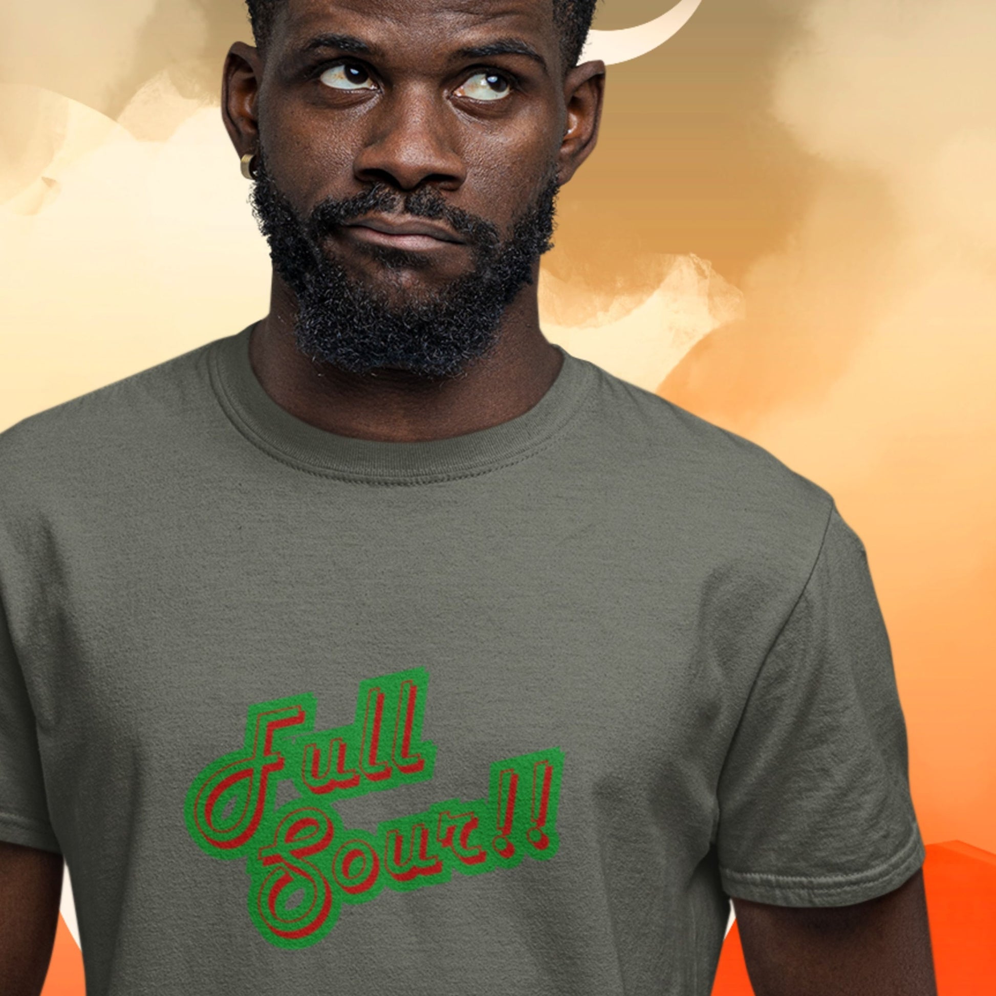 Man wearing an army green t-shirt with colorful humorous text on a smoky background.