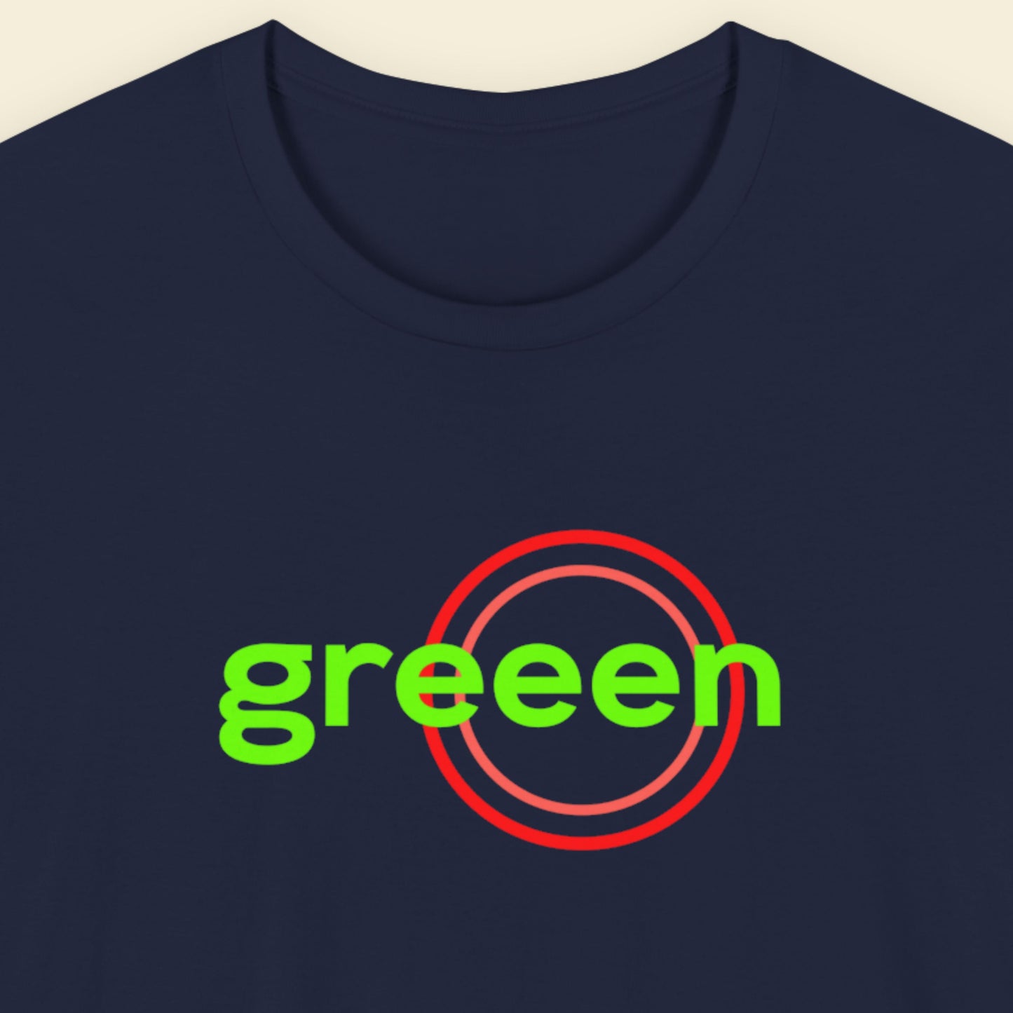 Navy blue t-shirt with humorous colorful text on a beige background.