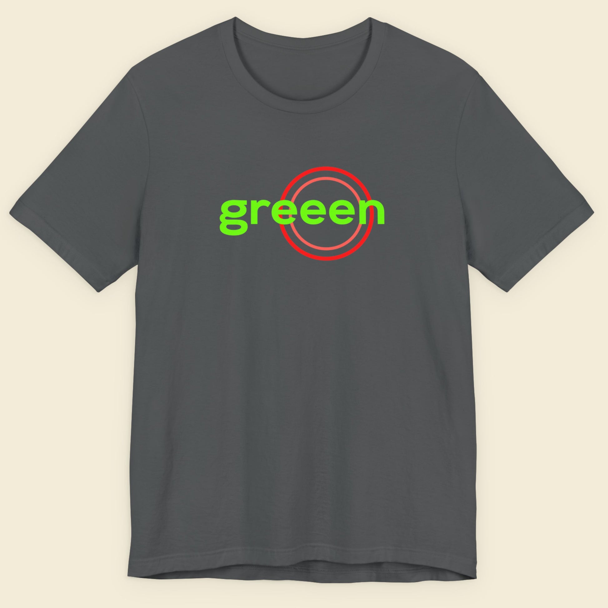 Gray t-shirt with 'greeen' text and red circle on a beige background.