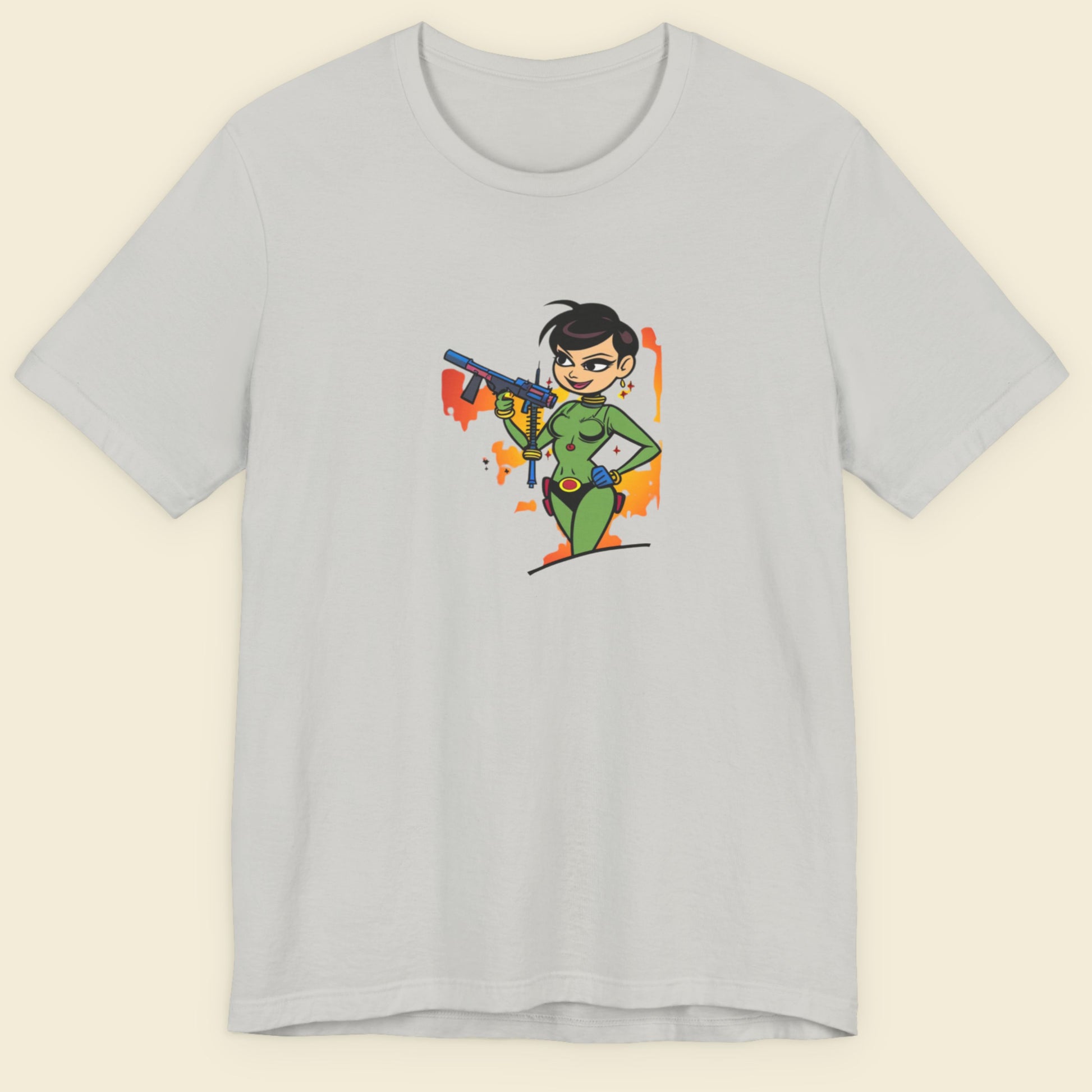 Grey t-shirt with a fun, colorful cartoon illustration on a beige background.