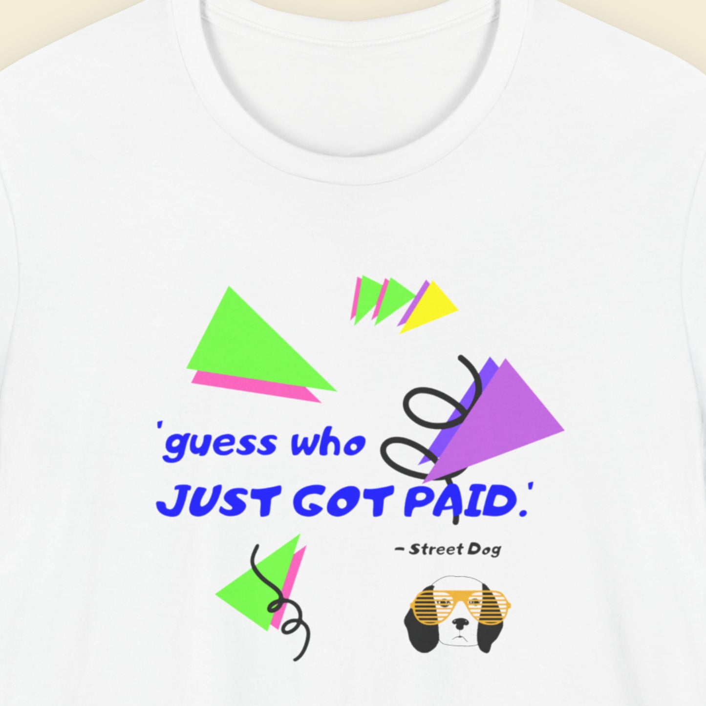 White t-shirt with colorful geometric design and text on a white background.