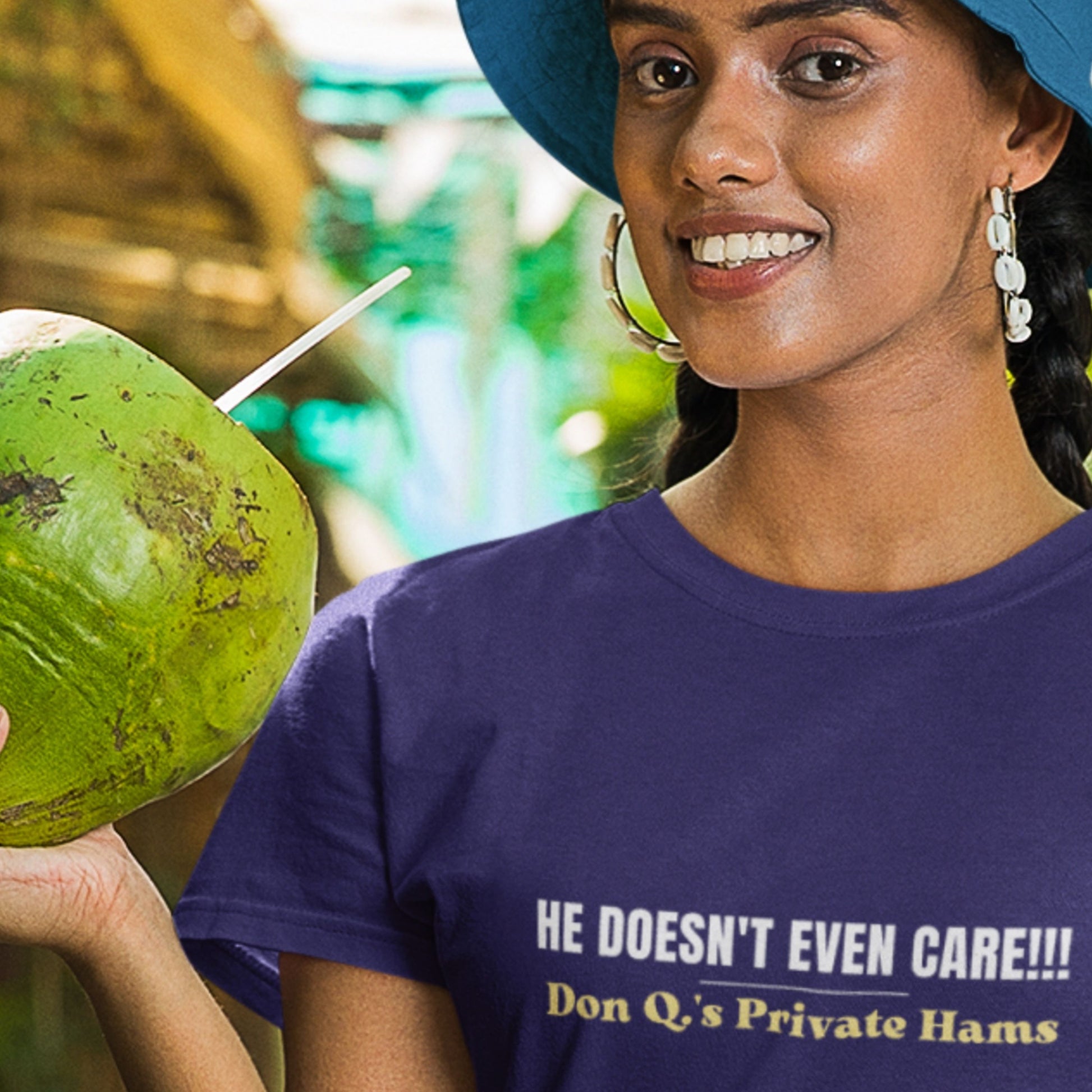 Woman holding a green coconut wearing a purple t-shirt with humorous text.