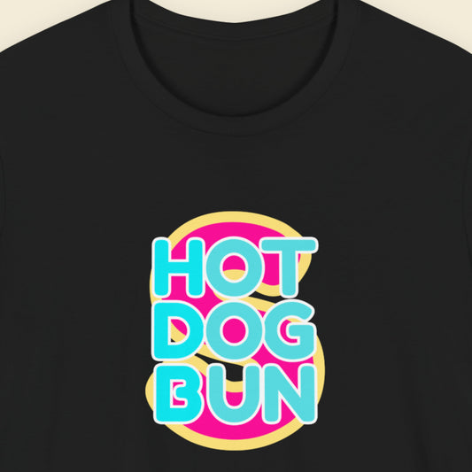 Black t-shirt with a fun, colorful cartoon illustration on a beige background.