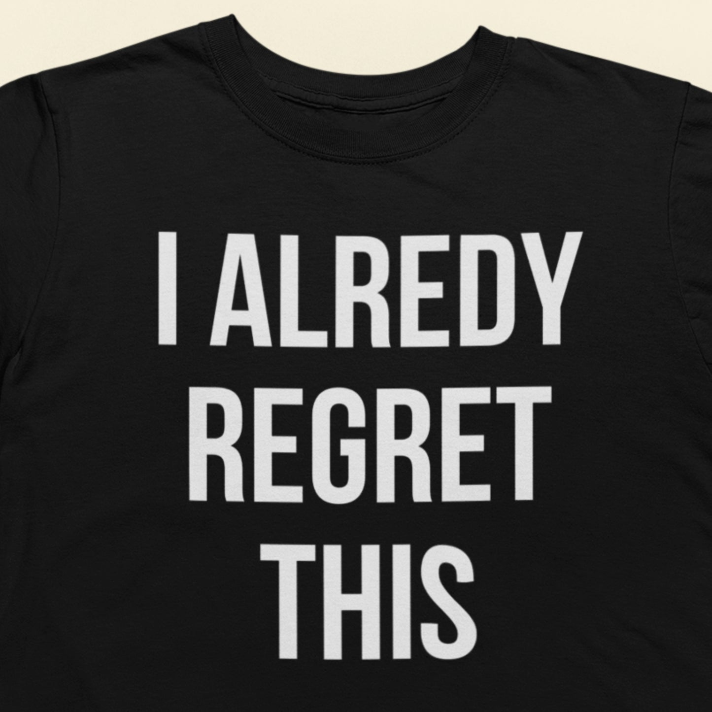 I already regret this text t-shirt black minimalist design closeup