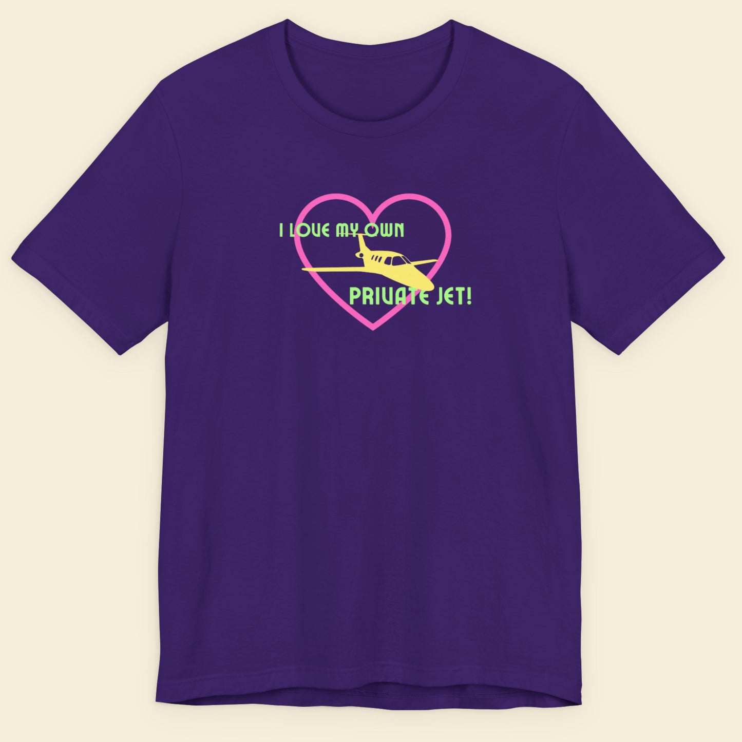 Purple t-shirt with a graphic design of a heart, airplane, and text on a beige background.