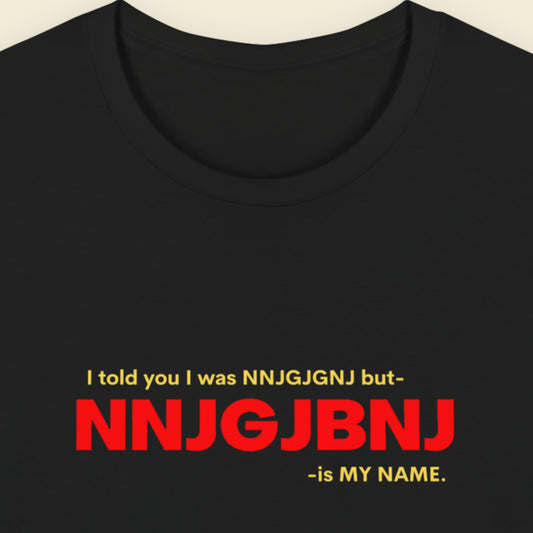 Black t-shirt with red and yellow text on a beige background.