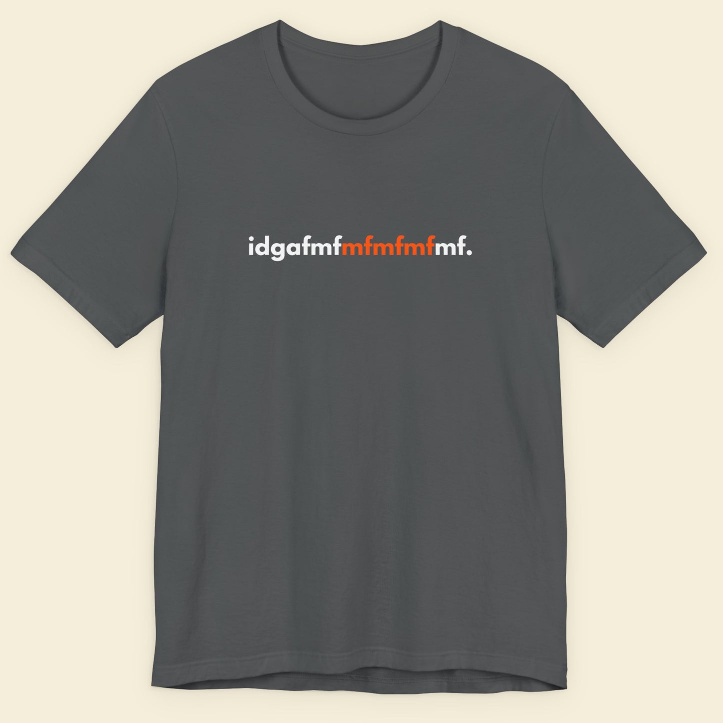 Gray t-shirt with 'idgafmfmfmfmfmf.' text on a beige background.