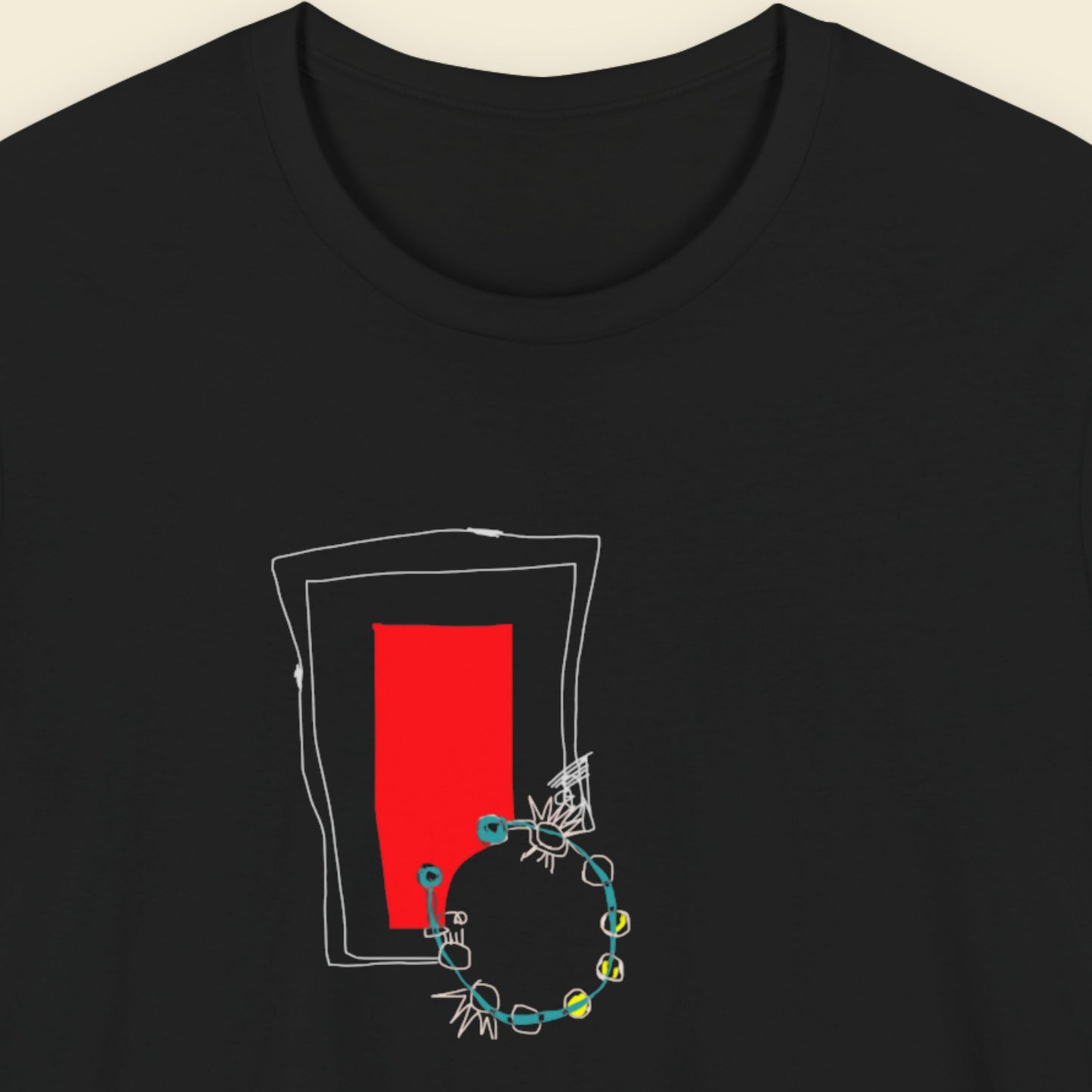Black t-shirt with a red square and blue necklace design on a beige background.