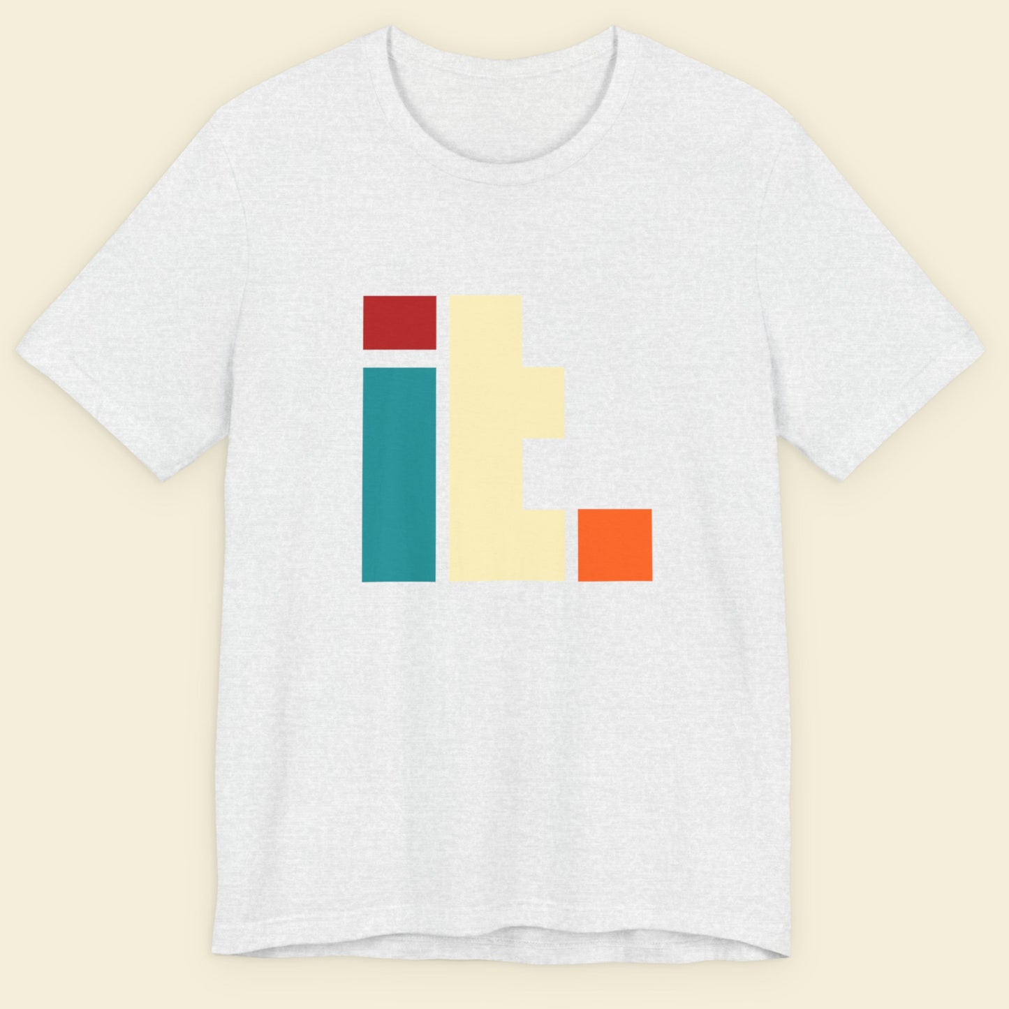 Ash grey t-shirt with colorful geometric design on a beige background.