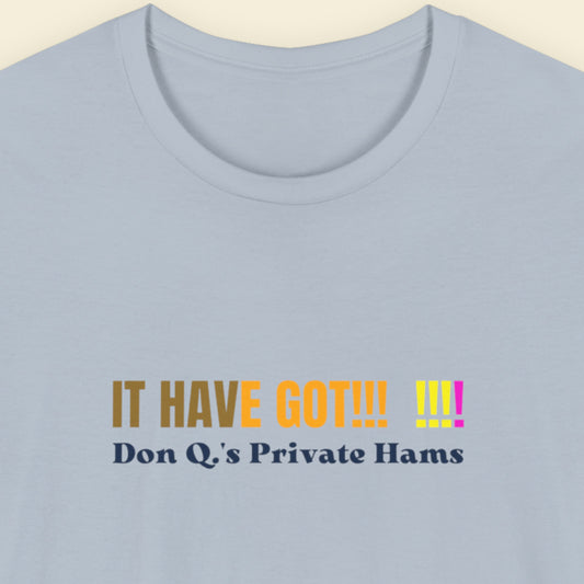 Light blue shirt with colorful nonsensical text on a beige background.