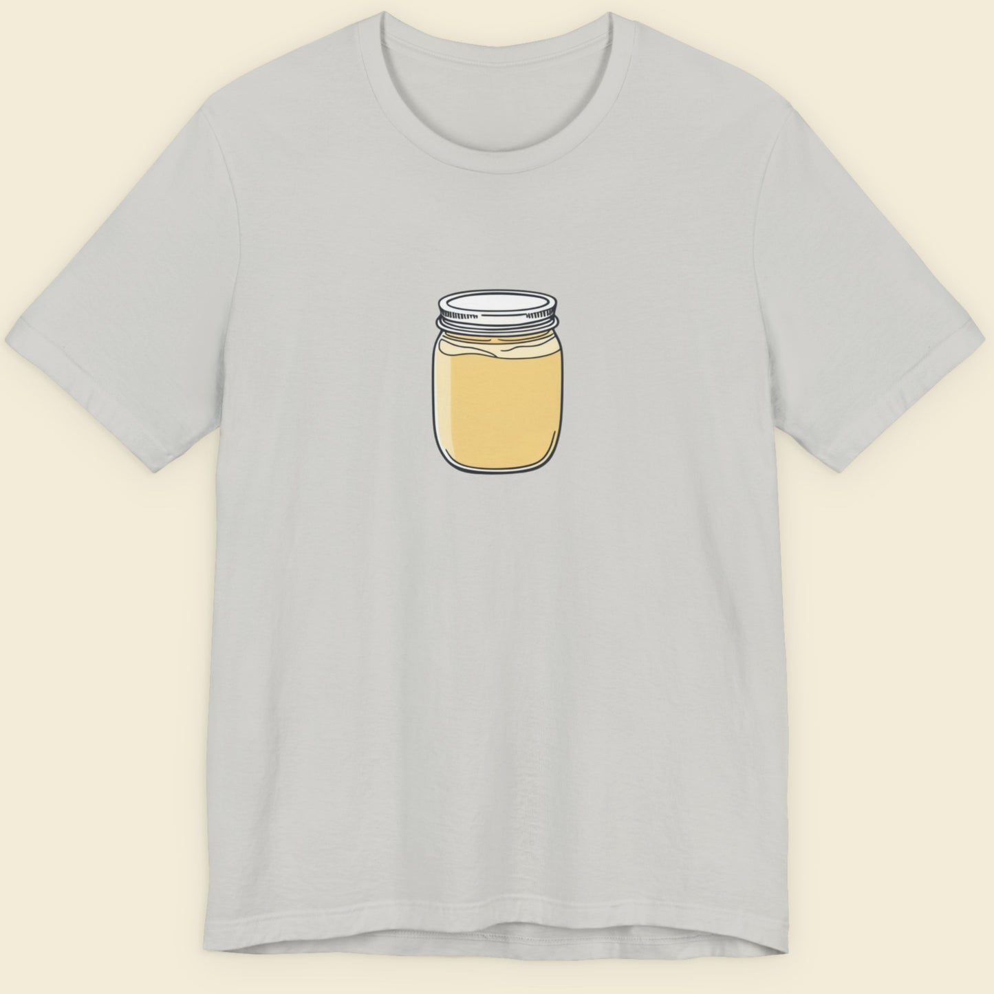 Light grey shirt with a drawing of a jar of custard.
