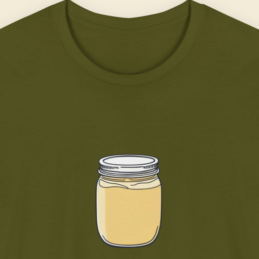 Olive green shirt with a drawing of a jar of yellow cream.