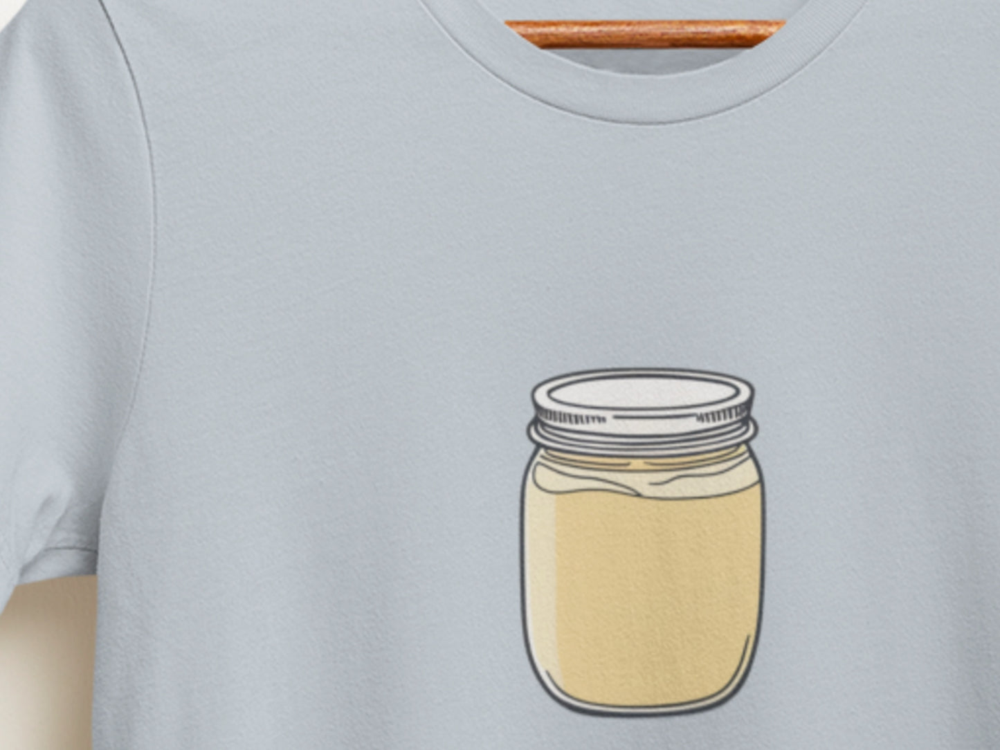 Jar Of Yellow Cream Light Blue T-Shirt.