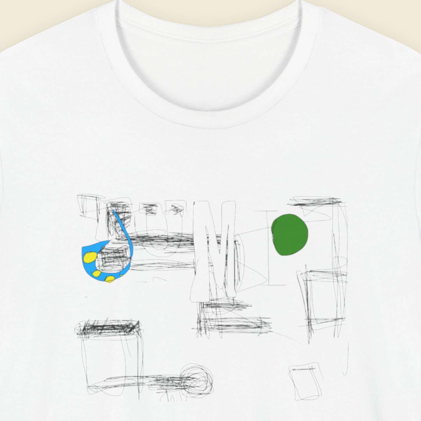 White t-shirt with a colorful abstract drawing on a beige background.