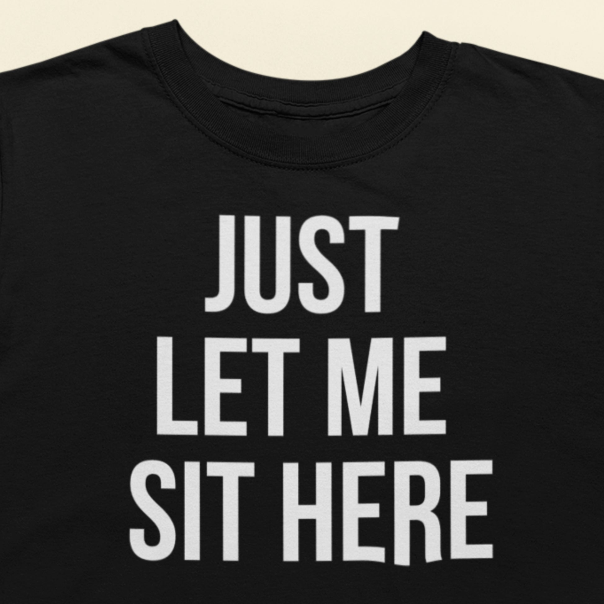 Just let me sit here text t-shirt black minimalist design closeup