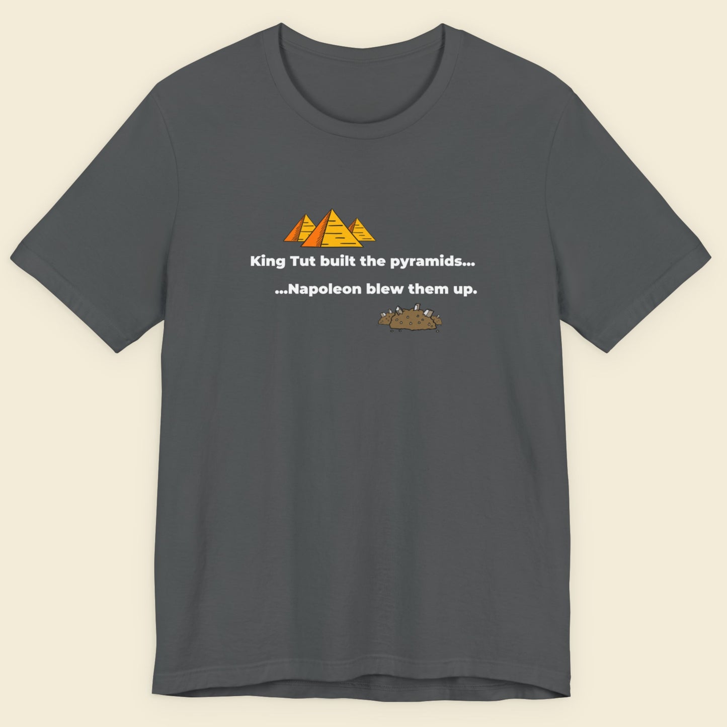 Gray t-shirt with humorous pyramid and pharaoh graphic and text on a beige background.