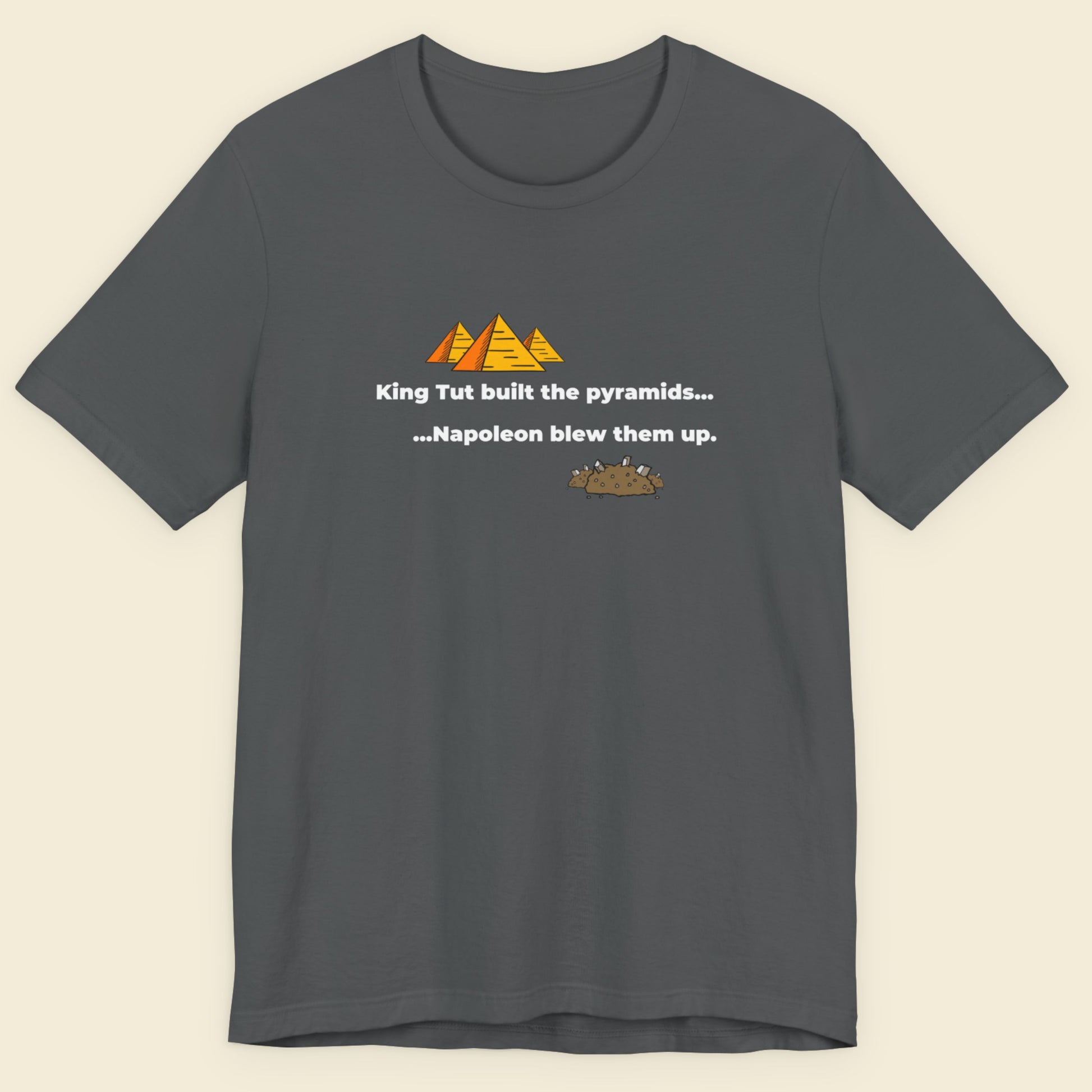 Gray t-shirt with humorous pyramid and pharaoh graphic and text on a beige background.