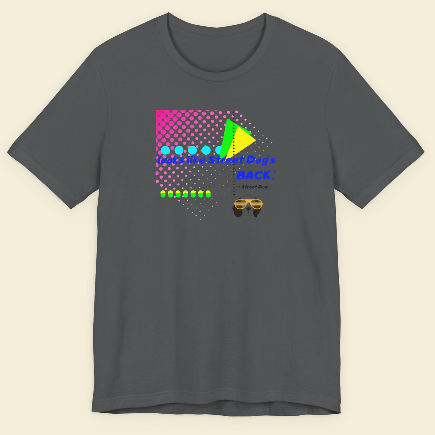 Gray t-shirt with colorful graphic design on a beige background.