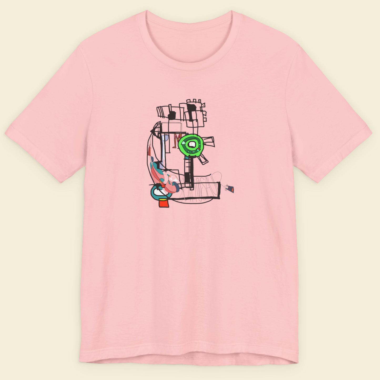 Pink t-shirt with a colorful graphic design on a beige background.