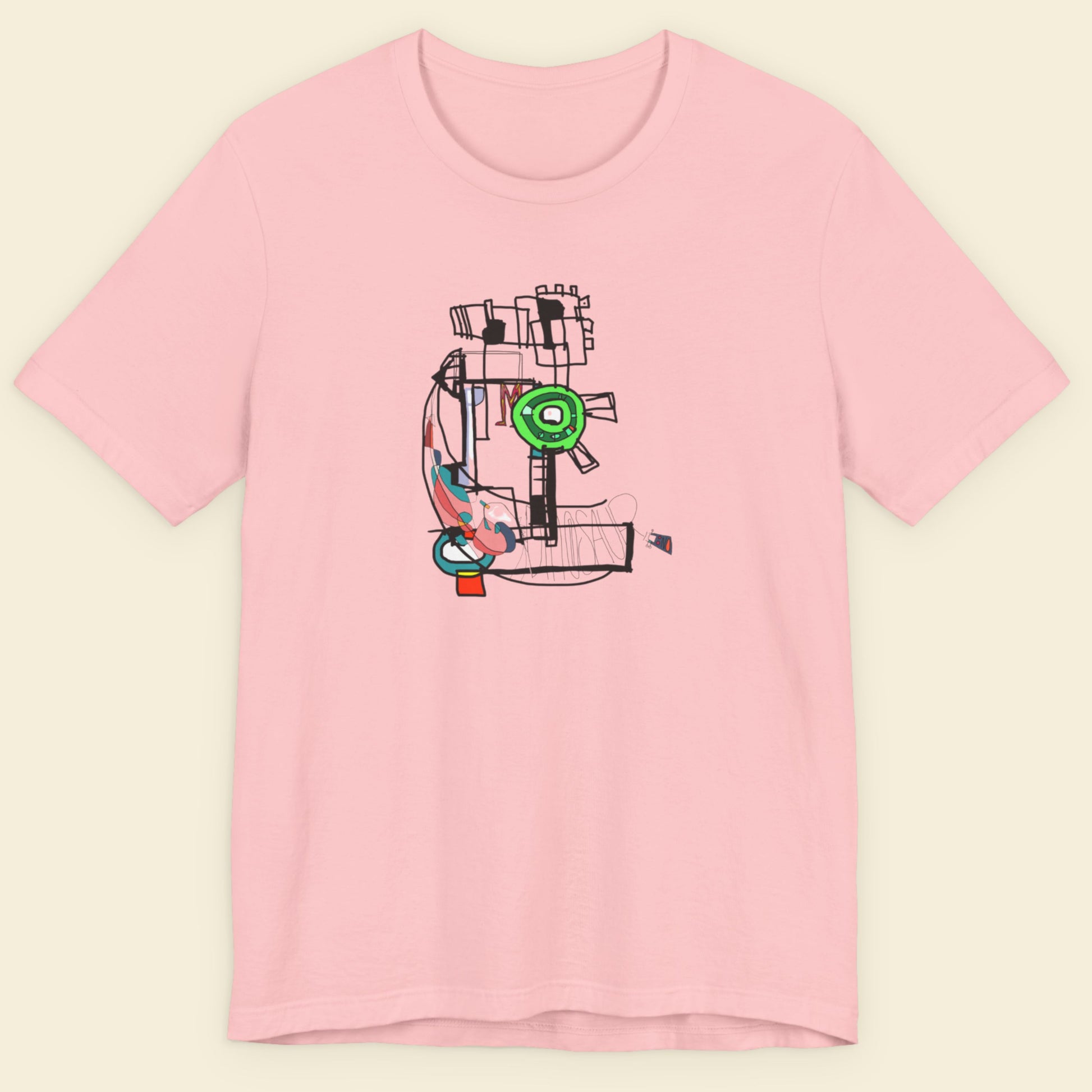 Pink t-shirt with a colorful graphic design on a beige background.