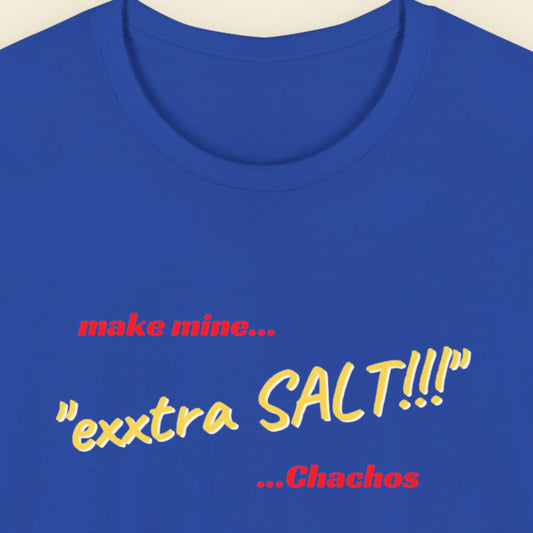 Blue t-shirt with text 'make mine... “extra SALT!!!” ...Chachos' on a beige background.