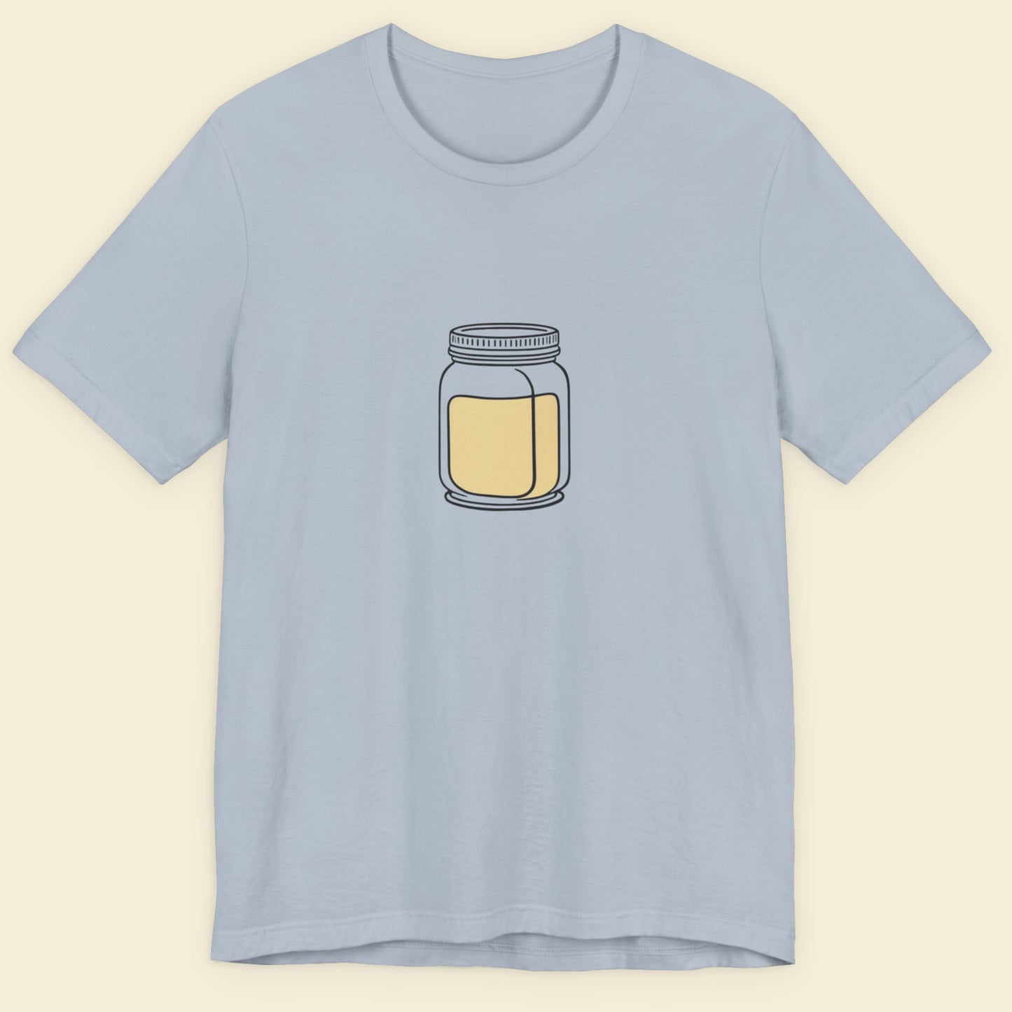 Light blue t-shirt with a jar of mayo graphic on a beige background.