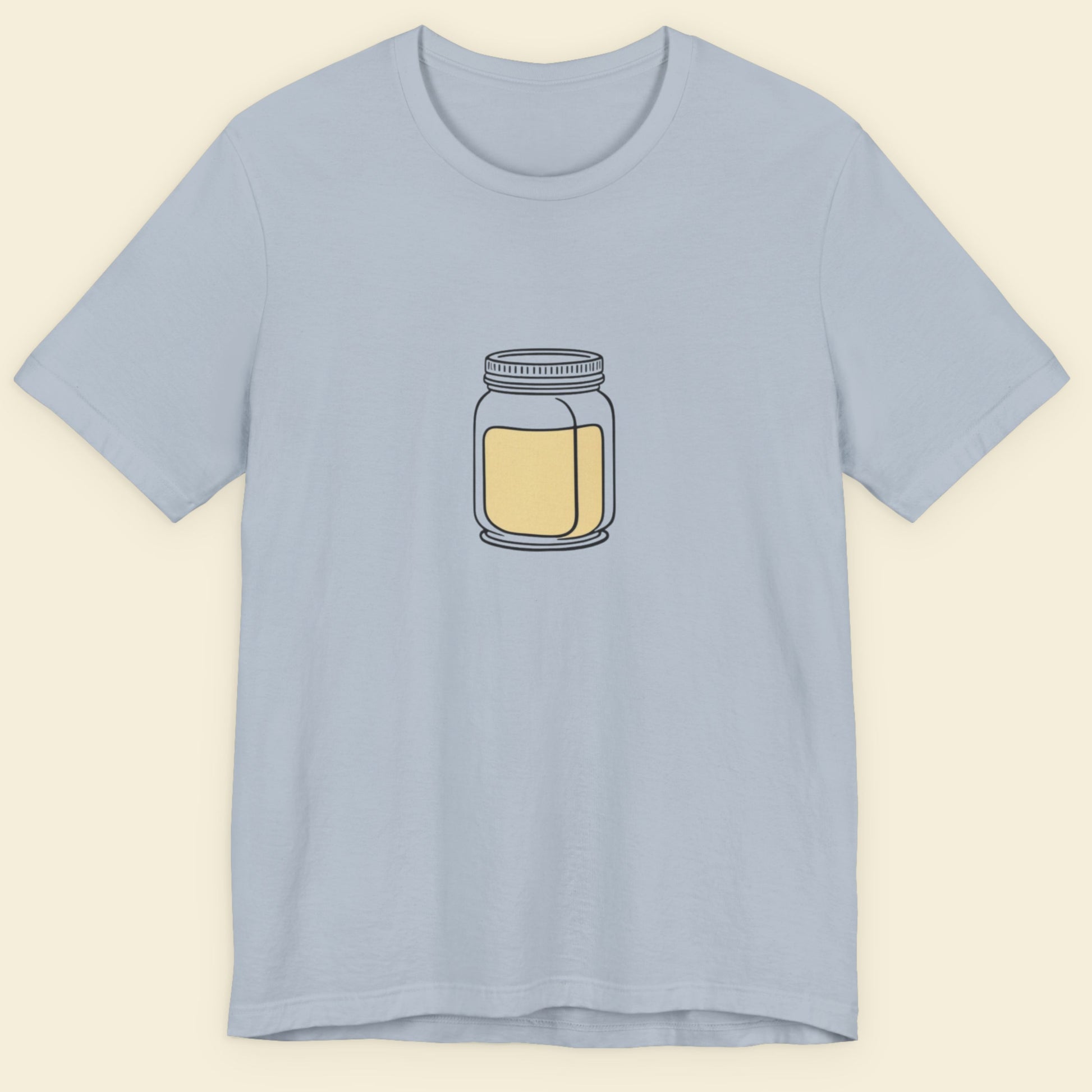 Light blue t-shirt with a jar of mayo graphic on a beige background.