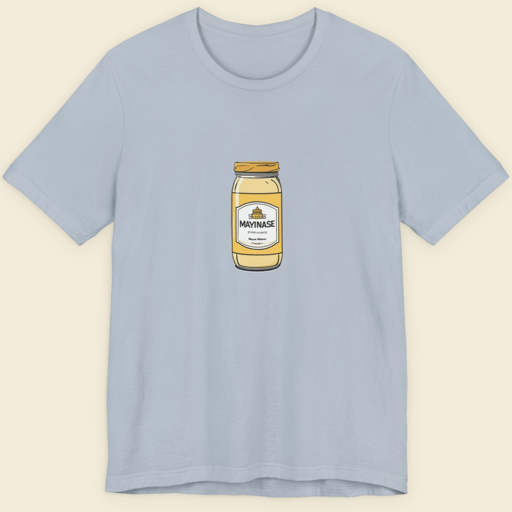 Light blue t-shirt with a drawing of a jar of Mayinase on a beige background.