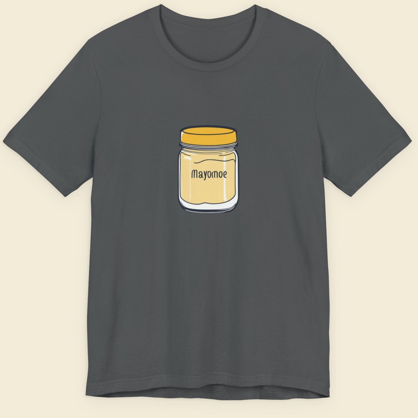 Grey t-shirt with an illustration of a jar of Mayomoe Dijon mayonnaise against a beige background.