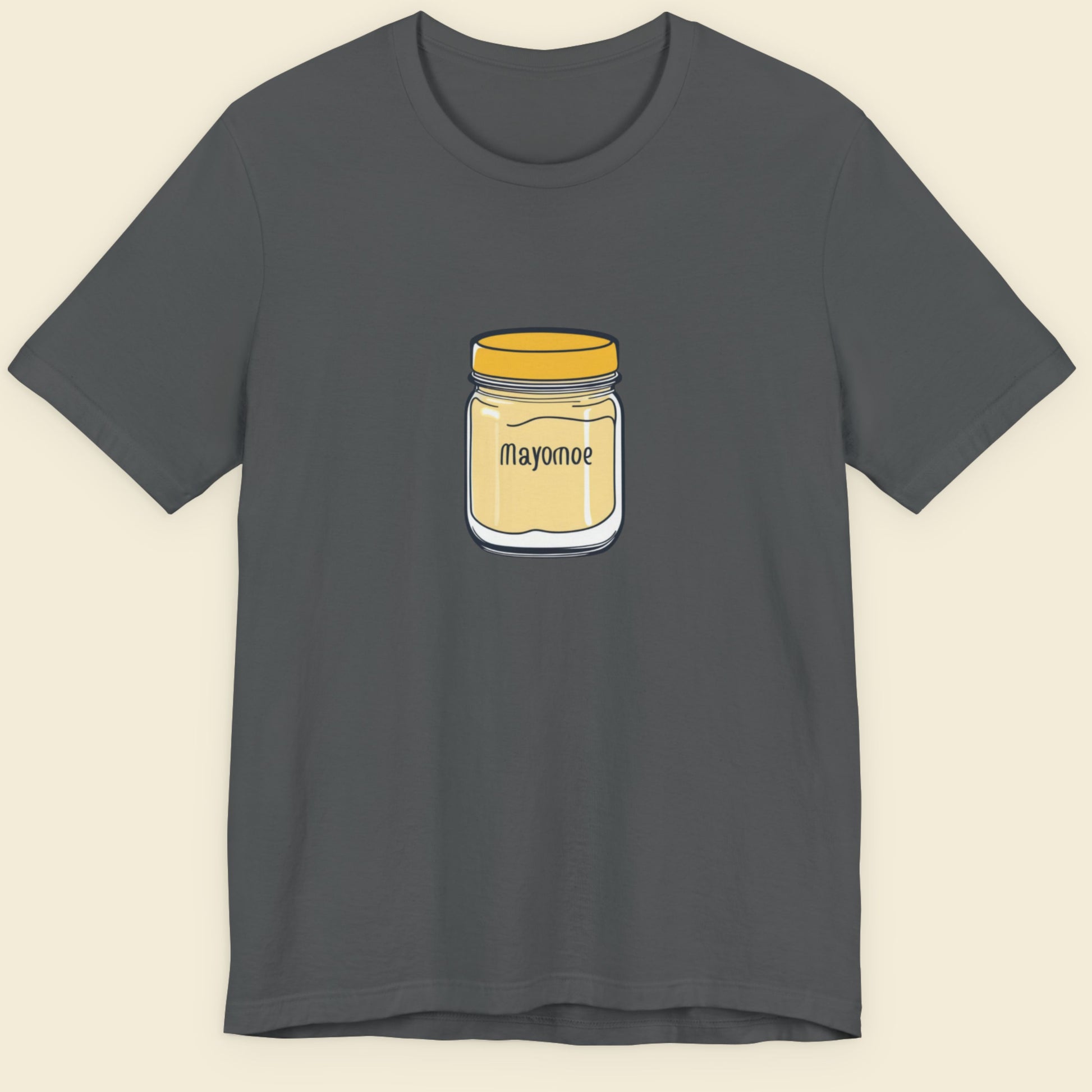 Grey t-shirt with an illustration of a jar of Mayomoe Dijon mayonnaise against a beige background.