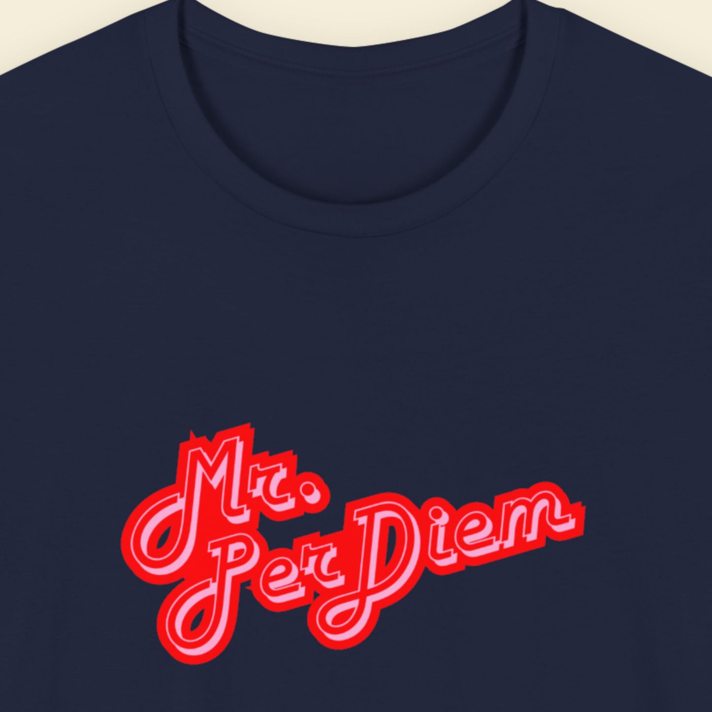 Navy t-shirt with colorful Mr. Per Diem text in red and pink on a beige background.