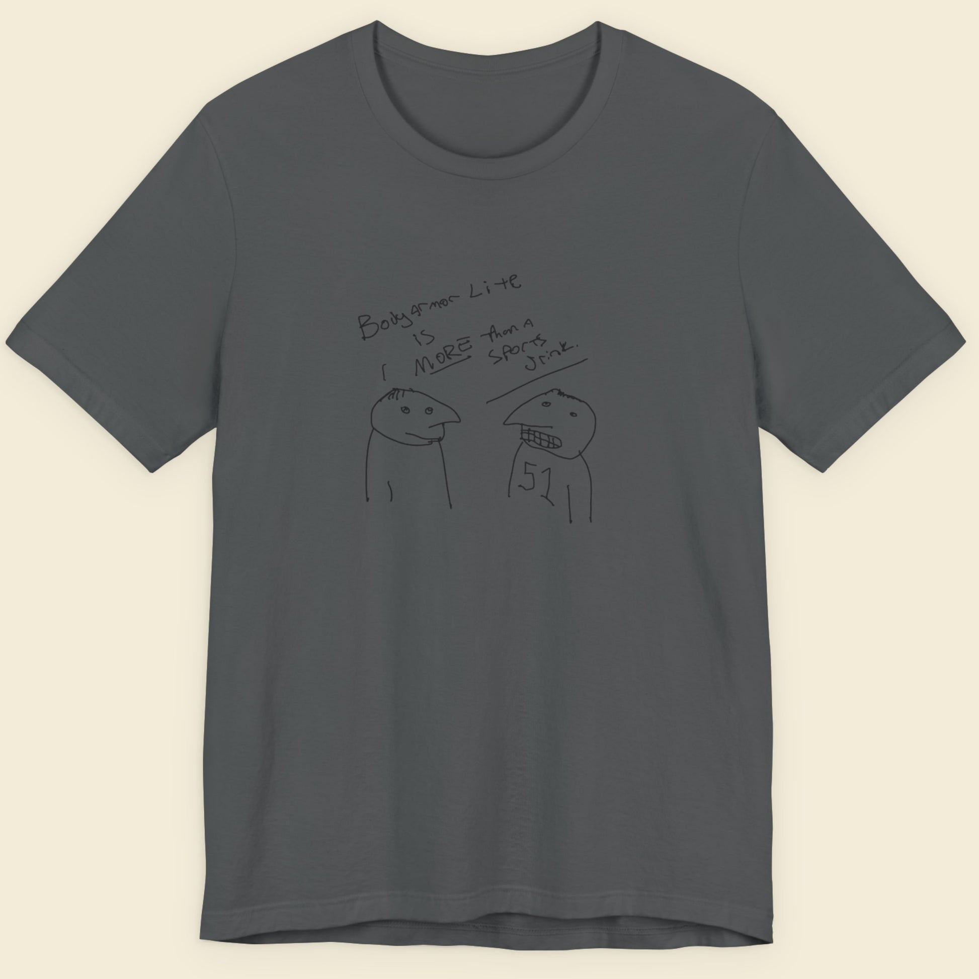 Grey t-shirt with a line drawing on a beige background.