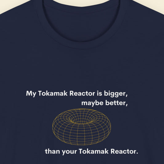 Navy blue t-shirt with text and graphic of a tokamak reactor on a beige background.