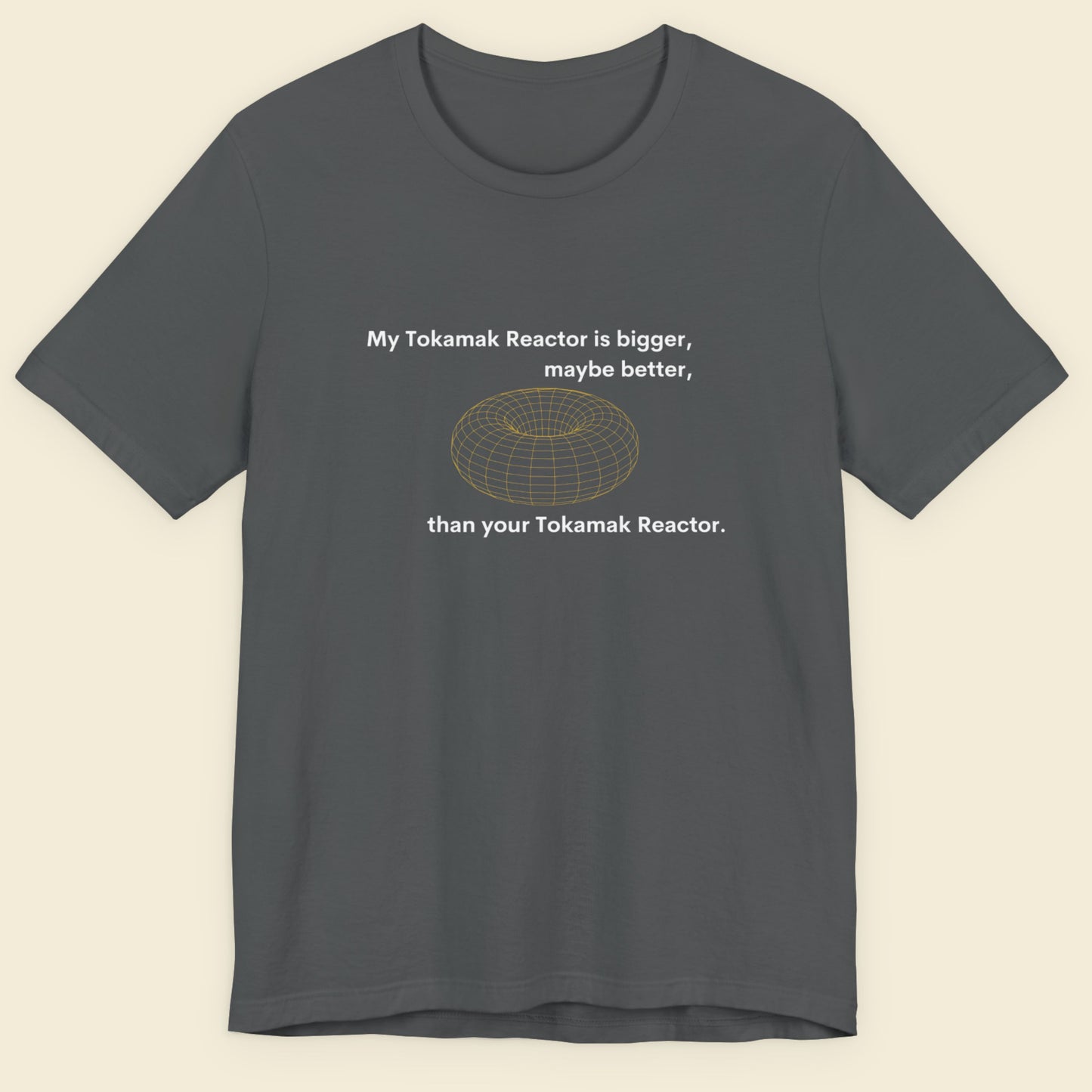 Gray t-shirt with text and graphic design on a beige background.