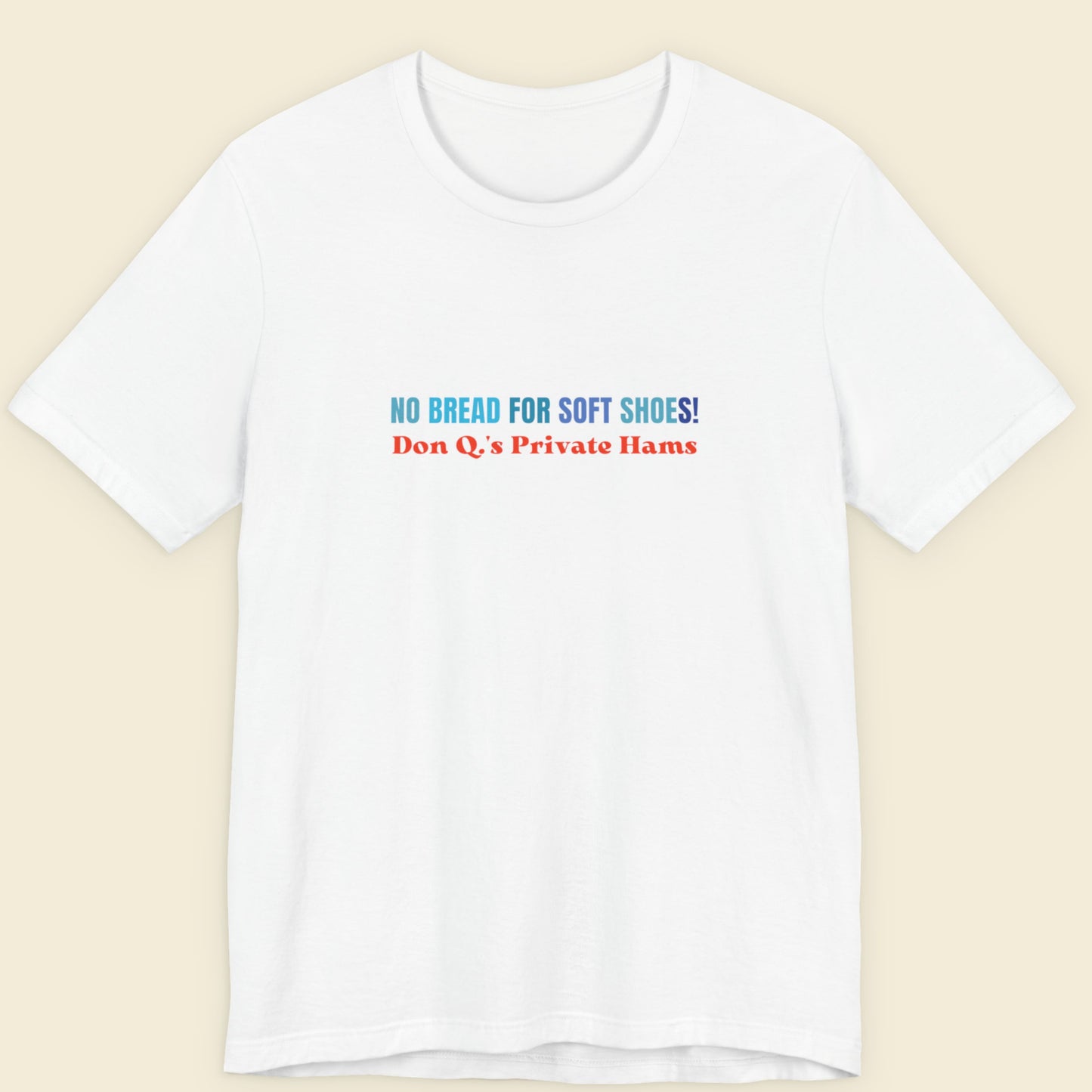 White t-shirt with humorous text design on a beige background