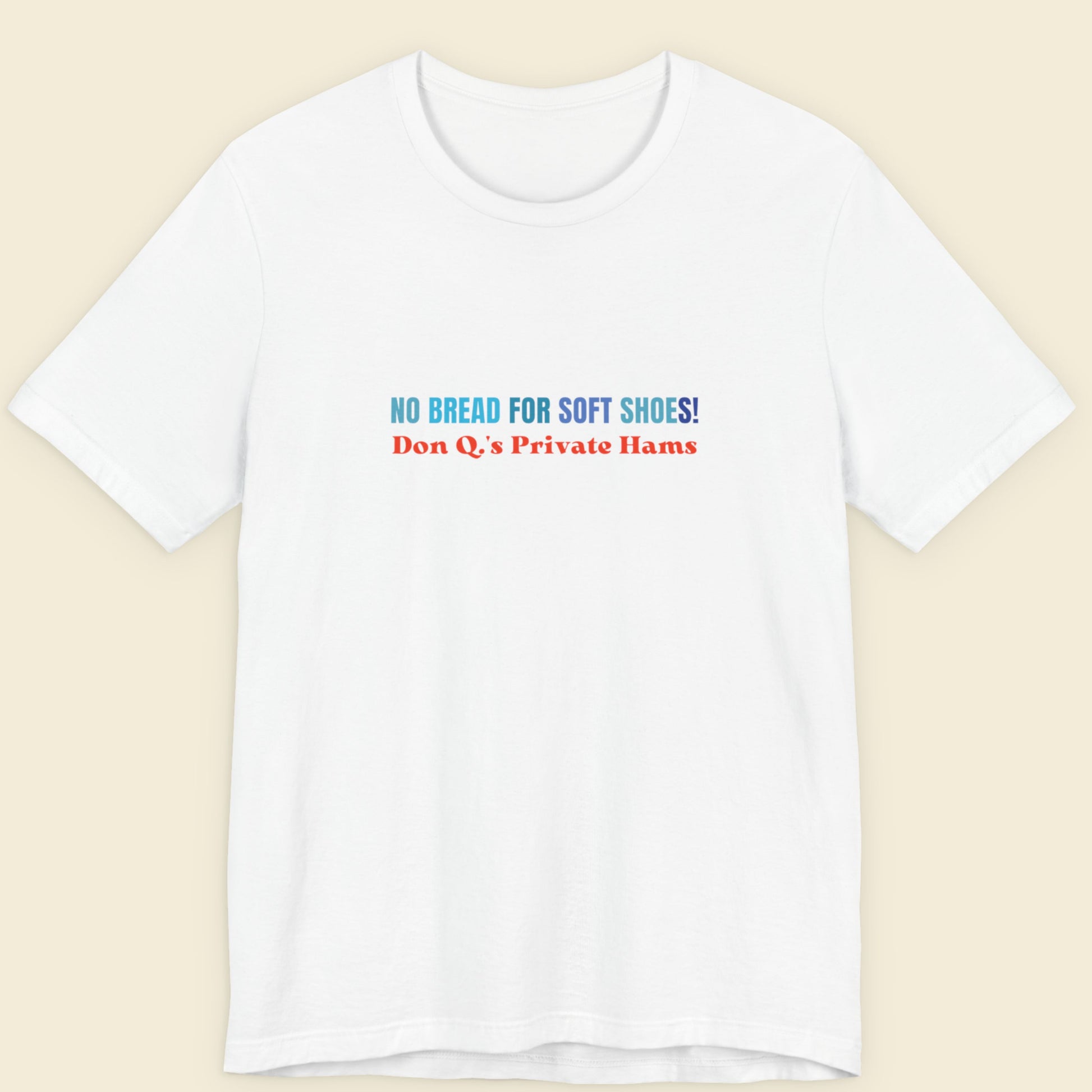 White t-shirt with humorous text design on a beige background