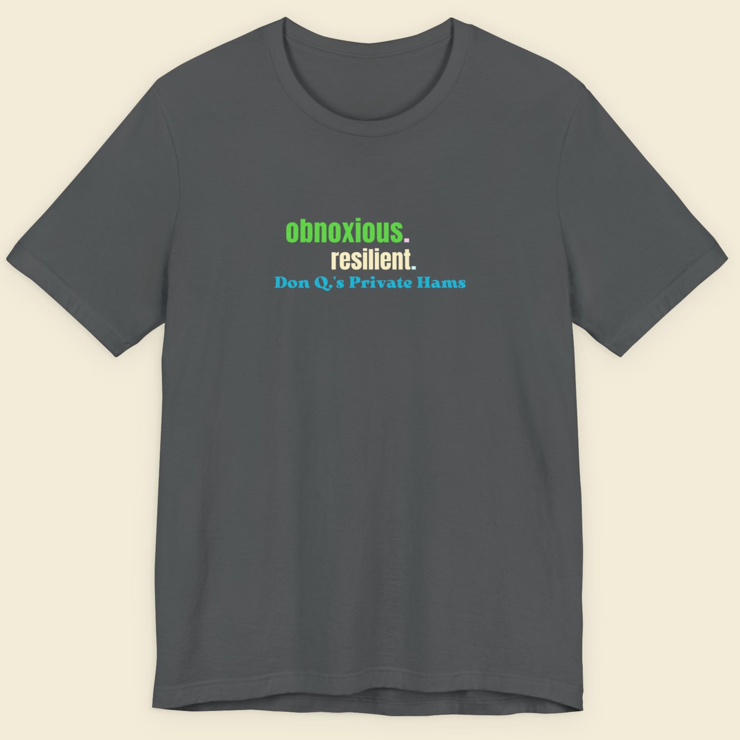 Gray t-shirt with text on a beige background.