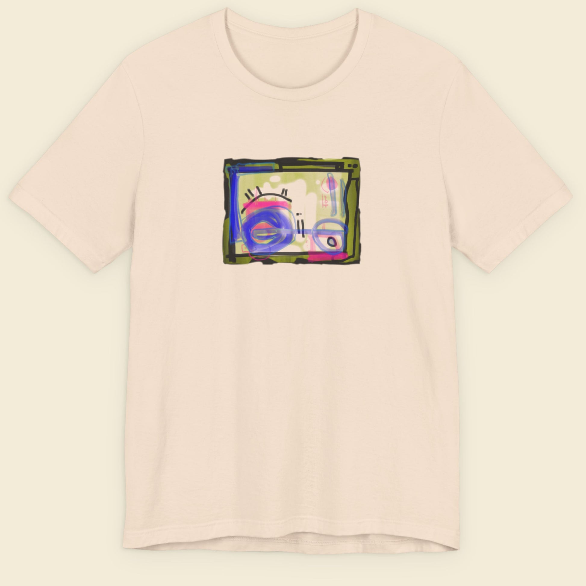 Beige t-shirt with a colorful abstract drawing on a beige background.