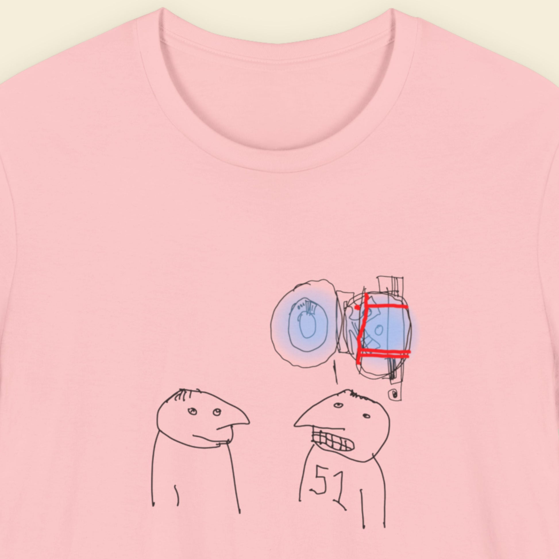 Pink t-shirt with a colorful abstract drawing on a beige background.