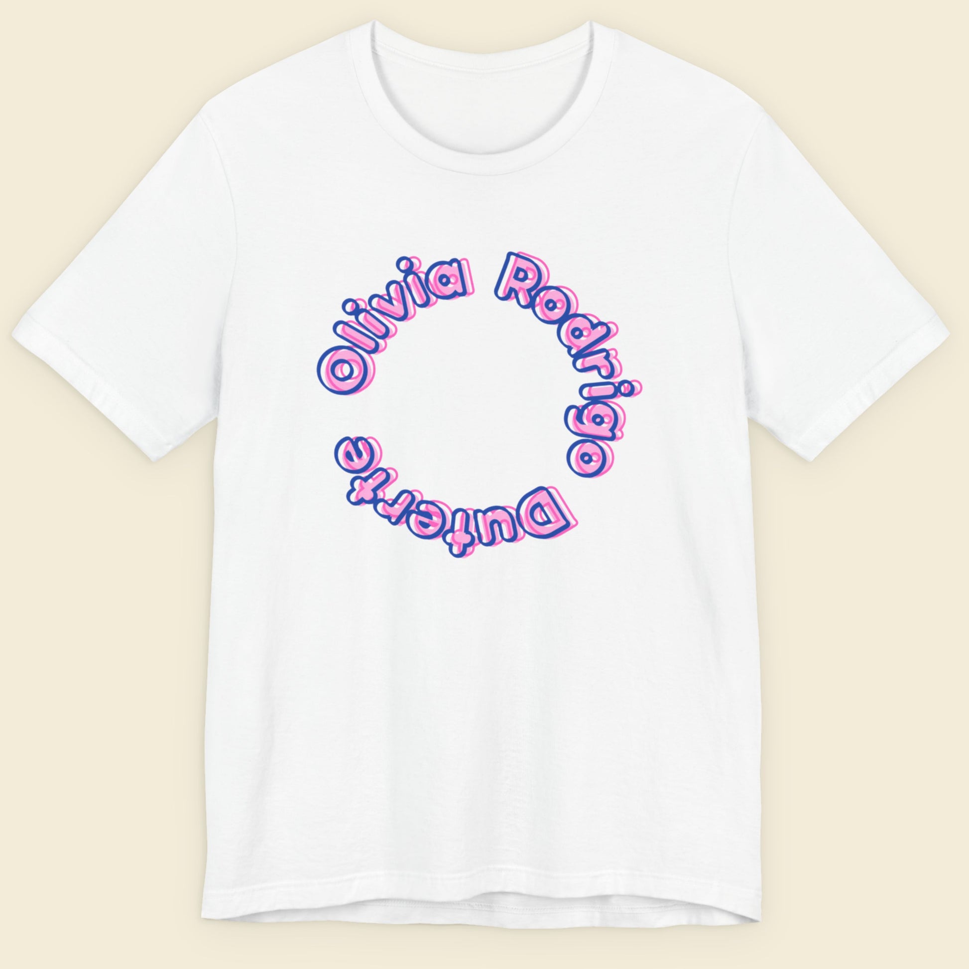 White t-shirt with multicolored 'Olivia Rodrigo Duterte' text on a beige background.