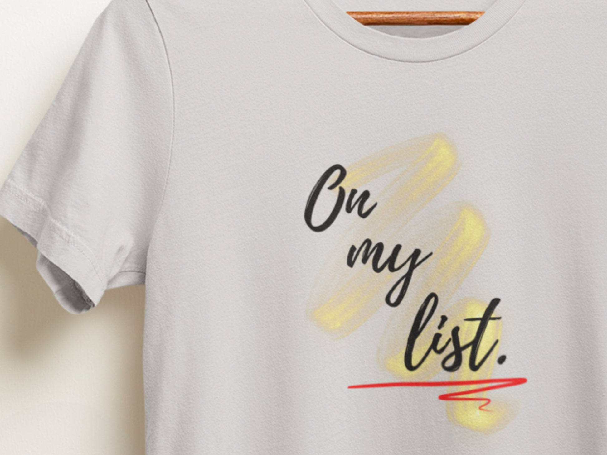 Silver grey t-shirt with 'On my list.' text on a white background