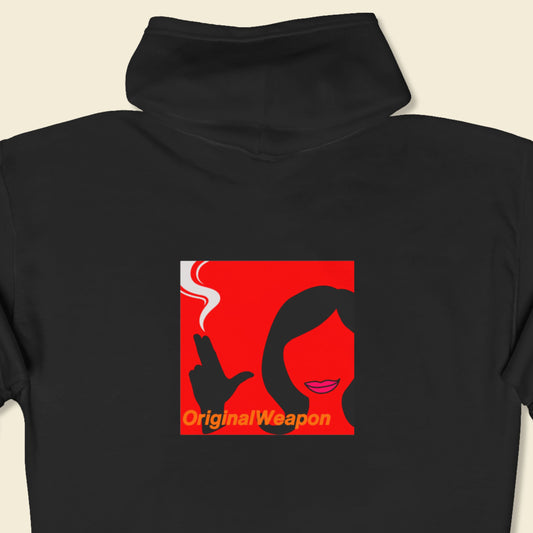 Black hoodie with a graphic design on the chest featuring a red square with a silhouette of a person and the text 'Original Weapon'.