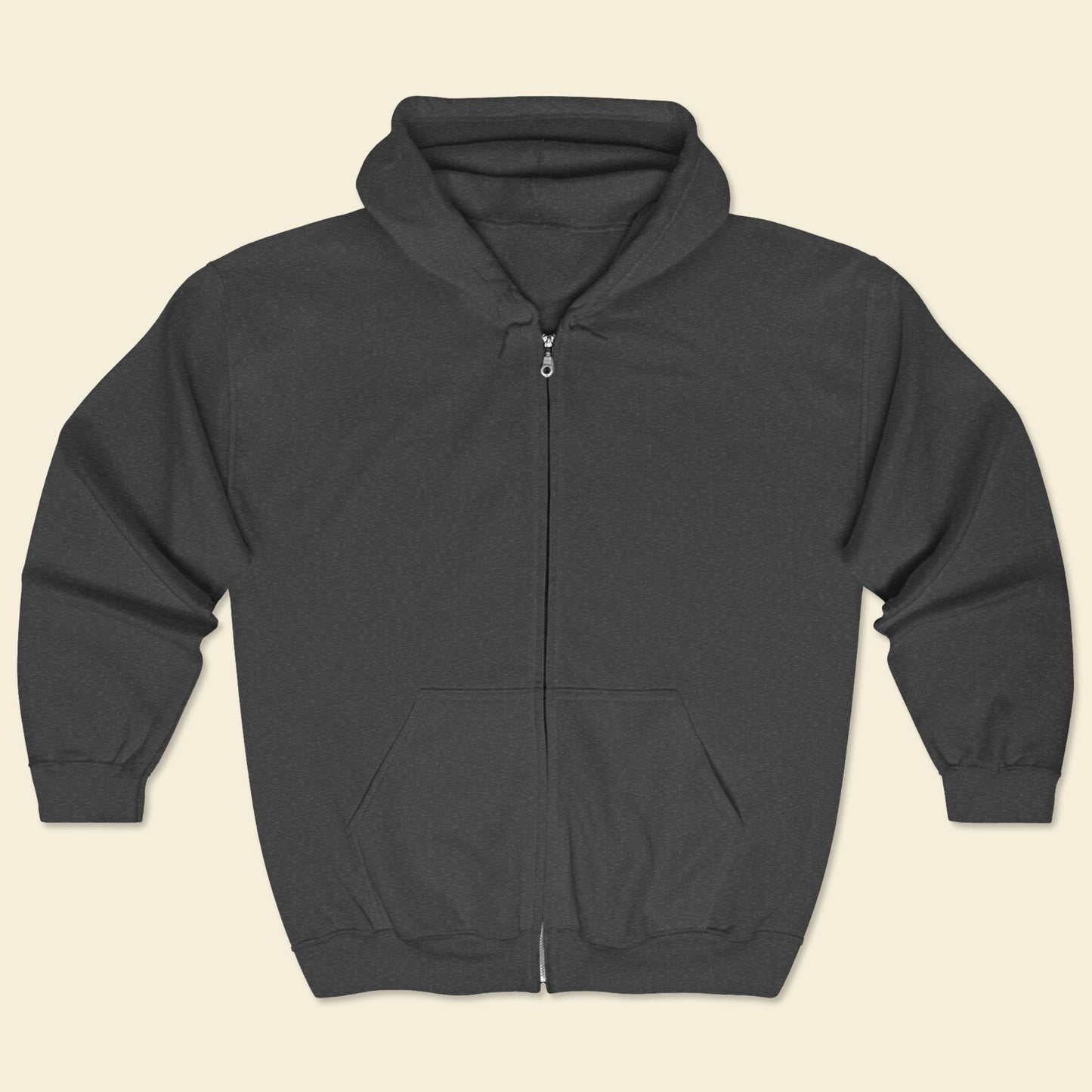 Dark gray hoodie with a zipper on a beige background.